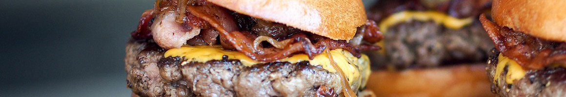 Eating Burger at Burger Barn restaurant in Irvine, KY.